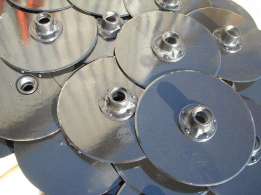 Фото 2. Сошник сеялки СЗ со смещенными дисками, сошник, диск сошника