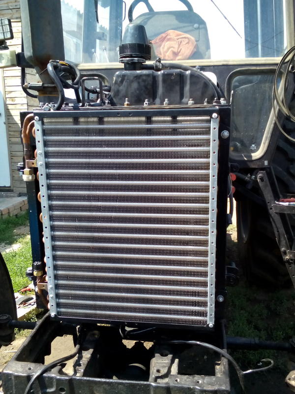 Фото 2. Радиатор конденсатор кондиционера трактора МТЗ 82.1 455x508x48 мм. (подкапотный медный)