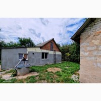 Продам цегляний будинок зі свіжим ремонтом в Кривошиїнцях